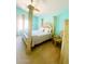 Charming bedroom featuring a four-post bed, decorative columns, and plenty of space at 15897 N Gil Balcome St, Surprise, AZ 85374