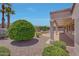 Backyard patio view featuring mature landscaping creating a serene outdoor setting at 16313 W Escondido Ct, Surprise, AZ 85374