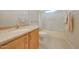 Bathroom features a granite vanity and a combined shower and tub at 16313 W Escondido Ct, Surprise, AZ 85374