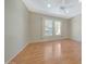 Spacious empty bedroom featuring a ceiling fan, recessed lights, and natural light from large windows at 16313 W Escondido Ct, Surprise, AZ 85374