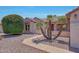 Inviting home exterior featuring a well-manicured yard and a pathway with accent lighting at 16313 W Escondido Ct, Surprise, AZ 85374