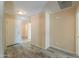 Inviting entryway showcasing wood-look tile flooring and a neutral color palette at 1652 E Judi St, Casa Grande, AZ 85122