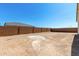 Spacious backyard with brick fence and desert landscaping at 18174 W Ashley Dr, Goodyear, AZ 85338