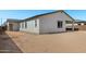 Home exterior with desert landscaping and view of the covered patio at 18174 W Ashley Dr, Goodyear, AZ 85338