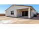 Home exterior with covered patio and desert landscaping at 18174 W Ashley Dr, Goodyear, AZ 85338