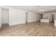 Bright living area with an open concept, recessed lighting, and tile floors at 18174 W Ashley Dr, Goodyear, AZ 85338