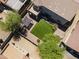 Aerial view of backyard featuring artificial grass, mature trees and a gazebo on a gravel area at 18390 W Hayden Dr, Surprise, AZ 85374