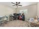 Bright bedroom with neutral carpet, natural light, and ample space for work or play at 18390 W Hayden Dr, Surprise, AZ 85374