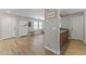 Inviting entryway featuring wood floors, coat rack, and plenty of natural light at 18390 W Hayden Dr, Surprise, AZ 85374