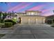 Stunning two-story home featuring a three-car garage and well-maintained landscaping at 1951 W Bartlett Ct, Chandler, AZ 85248