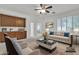 Open living room with bright natural light and built-in storage at 1951 W Bartlett Ct, Chandler, AZ 85248