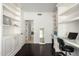Bright home office featuring custom built-ins and dark wood floors at 2026 E Cortez Dr, Gilbert, AZ 85234