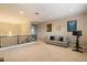 Bright bonus room with neutral carpet, comfortable seating, and overhead lighting at 22925 N 46Th St, Phoenix, AZ 85050