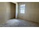 New construction bedroom featuring drywall walls, concrete flooring, and a closet at 2300 E Spur Dr, San Tan Valley, AZ 85140