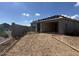 New construction home featuring a driveway ready for concrete, landscaping, and block fence at 2300 E Spur Dr, San Tan Valley, AZ 85140