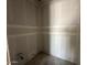 Unfinished bathroom ready to be fitted, showing the basic layout and plumbing connections for a future functional space at 2325 E Homesteader Rd, San Tan Valley, AZ 85140