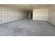 Expansive living room with unfinished walls and floors, providing a blank canvas for personalization and design at 2325 E Homesteader Rd, San Tan Valley, AZ 85140