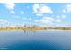Stunning lake view showcasing community amenities and scenic beauty at 2382 E Homesteader Rd, San Tan Valley, AZ 85140