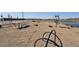 Community park features picnic tables and playground equipment near the water at 2382 E Homesteader Rd, San Tan Valley, AZ 85140