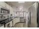Bright kitchen with stainless steel appliances and ample countertop space overlooking the dining area at 2579 E Camellia Dr, Gilbert, AZ 85296