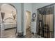 Tranquil main bedroom flows into a dressing room, featuring a walk-in closet and adjacent bathroom at 2579 E Camellia Dr, Gilbert, AZ 85296