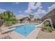 Backyard pool and diving board with white fence at 2579 E Camellia Dr, Gilbert, AZ 85296