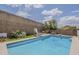 Backyard pool with a slide and a neutral deck at 2579 E Camellia Dr, Gilbert, AZ 85296