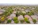 Neighborhood aerial view showing well-maintained homes with swimming pools, lush landscaping, and a sense of community at 2610 E Leiber Ln, Phoenix, AZ 85024
