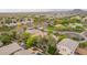 Community aerial view showcasing a vibrant neighborhood park with green spaces, walking paths, and mature landscaping at 2610 E Leiber Ln, Phoenix, AZ 85024