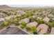 Neighborhood aerial view featuring cozy homes with swimming pools and lush landscaping, capturing a sense of community at 2610 E Leiber Ln, Phoenix, AZ 85024