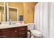 Classic bathroom featuring a single vanity and a shower with a curtain at 2610 E Leiber Ln, Phoenix, AZ 85024