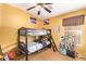 Colorful bedroom featuring a bunk bed and space for toys at 2610 E Leiber Ln, Phoenix, AZ 85024