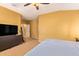 Cozy bedroom, featuring neutral tones, a ceiling fan and carpet floors at 2610 E Leiber Ln, Phoenix, AZ 85024
