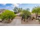 Charming single-story home with a well-maintained front yard and driveway at 2610 E Leiber Ln, Phoenix, AZ 85024