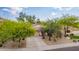 Front exterior of a charming single-story home with a well-manicured front yard at 2610 E Leiber Ln, Phoenix, AZ 85024