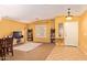 Open concept living area showcasing a combination of tile and carpet flooring at 2610 E Leiber Ln, Phoenix, AZ 85024