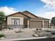 Charming single-story home with stone accents, three-car garage and desert landscaping at 281 W Flax Dr, San Tan Valley, AZ 85140