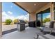 Back patio features a built in grill and patio set at 3264 E Luna Dr, San Tan Valley, AZ 85143