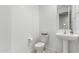 Powder room with pedestal sink and tiled floor at 3264 E Luna Dr, San Tan Valley, AZ 85143
