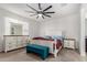 Bright bedroom featuring neutral walls, plush carpeting, and a ceiling fan at 3264 E Luna Dr, San Tan Valley, AZ 85143