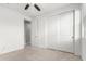 Bedroom featuring a double door closet and a walk-in closet at 3264 E Luna Dr, San Tan Valley, AZ 85143