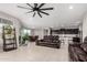 Open concept living space with a seamless flow between the kitchen, dining, and living areas at 3264 E Luna Dr, San Tan Valley, AZ 85143