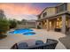 Expansive backyard with a stunning pool, spa, and covered patio, perfect for outdoor living and relaxation at 35206 N 27Th Ave, Phoenix, AZ 85086