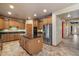 Spacious kitchen with granite countertops, stainless steel appliances, and a large island for food preparation at 35206 N 27Th Ave, Phoenix, AZ 85086