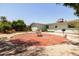 Backyard area with a circular brick patio perfect for outdoor dining and entertaining at 3741 W Davidson Ln, Phoenix, AZ 85051