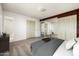 Spacious bedroom with ample closet space and a view of the en-suite bathroom at 3741 W Davidson Ln, Phoenix, AZ 85051