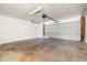 Spacious two car garage with an automatic garage door at 3741 W Davidson Ln, Phoenix, AZ 85051