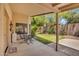 Outdoor patio with dining set offering peaceful backyard views at 3926 E Lavender Ln, Phoenix, AZ 85044
