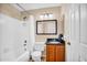 Charming bathroom with a bathtub, shower and stylish vanity at 3926 E Lavender Ln, Phoenix, AZ 85044