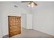 Spacious bedroom featuring a dresser and doorway to an adjacent room at 3926 E Lavender Ln, Phoenix, AZ 85044
